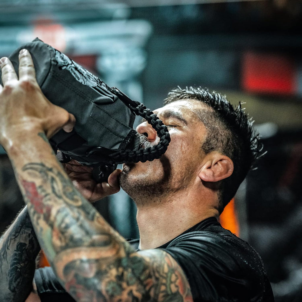 Iron Infidel Battle Bottle - Half Gallon Water Bottle Insulated, 64 oz Stainless Steel Water Jug with Handle - Gym Water Bottle for Men with Rugged Sleeve for Storage (Earned, Not Given 2 Liter)