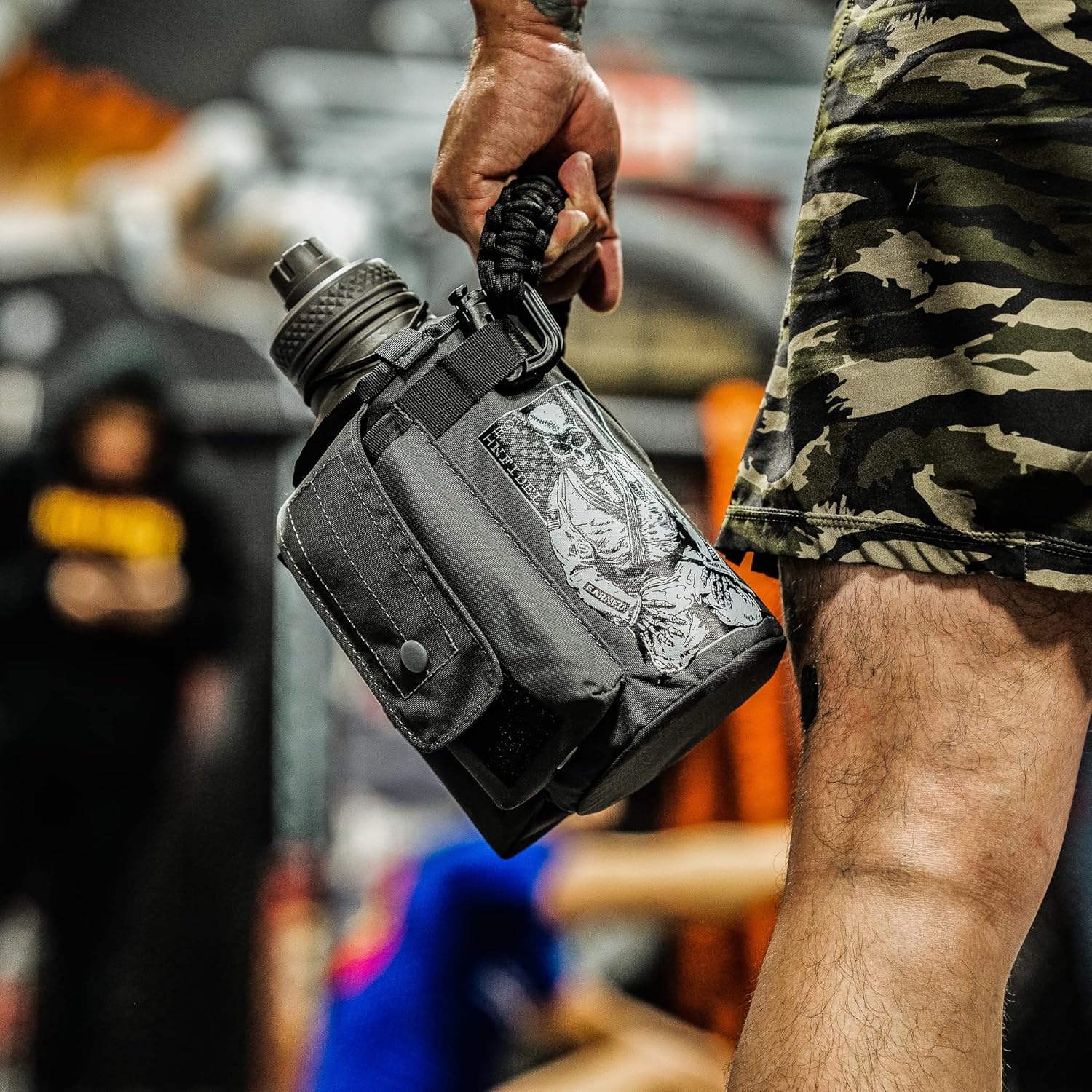 Iron Infidel Battle Bottle - Half Gallon Water Bottle Insulated, 64 oz Stainless Steel Water Jug with Handle - Gym Water Bottle for Men with Rugged Sleeve for Storage (Earned, Not Given 2 Liter)